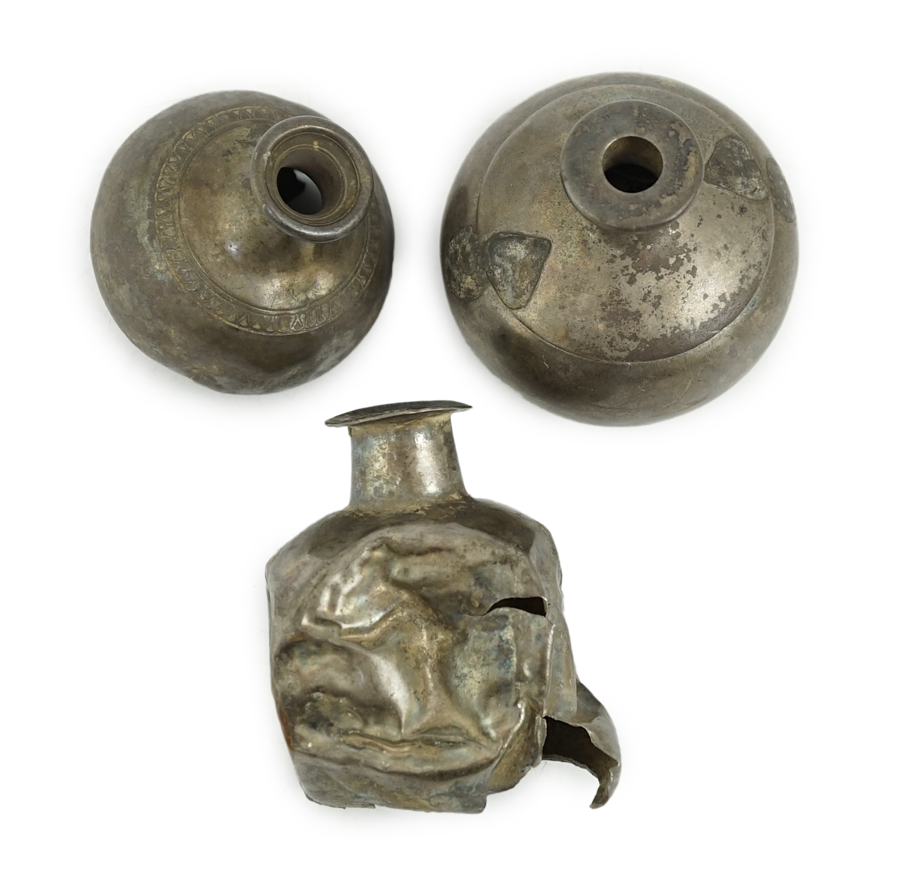 Three silver aryballoi, incomplete, Roman or Gandhara, c. late 1st century BC - early 1st century A.D.